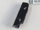 Botón interruptor de bloqueo de puertas