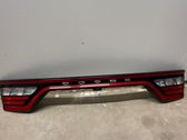 Trunk door license plate light bar