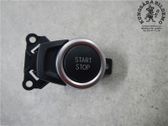 Bouton poussoir de démarrage du moteur
