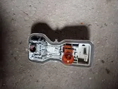 Tail light bulb cover holder