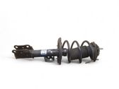 Front shock absorber with coil spring