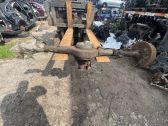 Rear axle beam with reductor