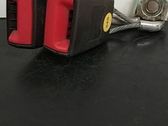 Middle seatbelt buckle (rear)