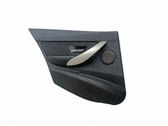 Moldura del tarjetero de la puerta trasera