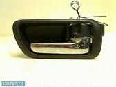 Manecilla interna puerta delantera