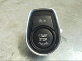 Bouton poussoir de démarrage du moteur