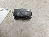 Botón interruptor de bloqueo de puertas