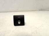 Botón interruptor de bloqueo de puertas