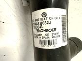 Front shock absorber with coil spring