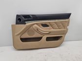 Front door card panel trim
