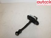 Front door check strap stopper
