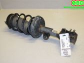 Front shock absorber with coil spring