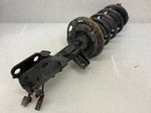 Front shock absorber with coil spring