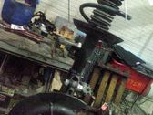 Front shock absorber with coil spring