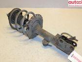 Front shock absorber with coil spring