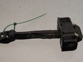 Front door check strap stopper