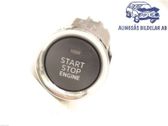Bouton poussoir de démarrage du moteur