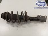 Front shock absorber with coil spring