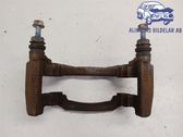 Plaquette / support d'étrier avant