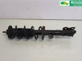 Front shock absorber with coil spring