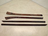 Front door trim bar