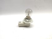 Tail light bulb cover holder