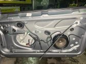 Regulador de puerta delantera con motor
