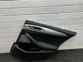 Rear door card panel trim
