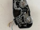 Tail light bulb cover holder