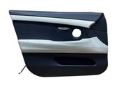 Front door card panel trim