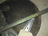 Rear door manual window regulator