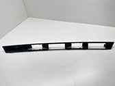 Trunk door license plate light bar