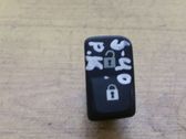 Botón interruptor de bloqueo de puertas
