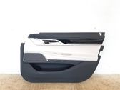 Front door card panel trim