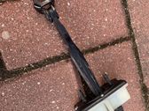 Rear door check strap stopper
