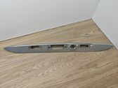 Trunk door license plate light bar
