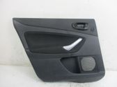 Moldura del tarjetero del panel de la puerta trasera