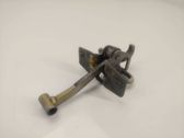 Front door check strap stopper