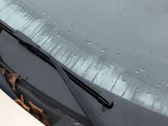 Front wiper blade arm