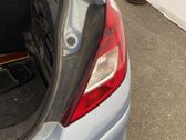 Tail light bulb cover holder