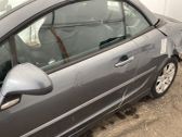 Rear door window regulator with motor