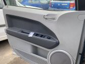 Front door card panel trim