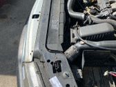 Radiator support slam panel