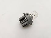 Tail light bulb cover holder