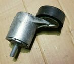 Alternator belt tensioner