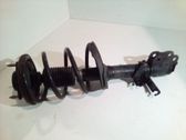 Front shock absorber with coil spring