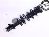 Front shock absorber with coil spring
