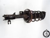 Front shock absorber with coil spring