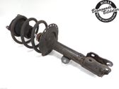 Front shock absorber with coil spring