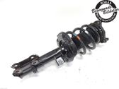 Front shock absorber with coil spring